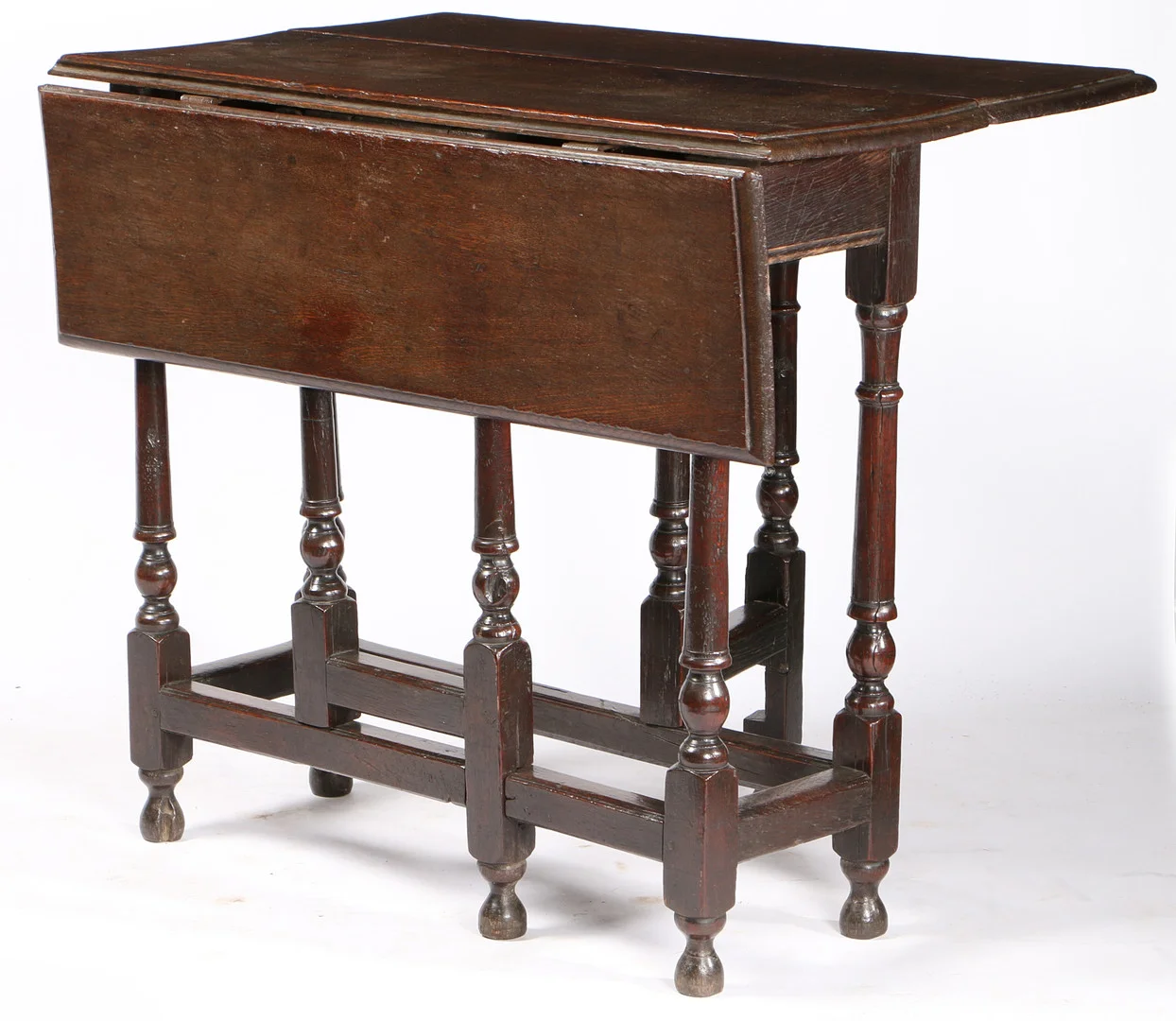 A WILLIAM & MARY OAK GATELEG OCCASIONAL TABLE, CIRCA 1700. — Tables — Bishop & Miller