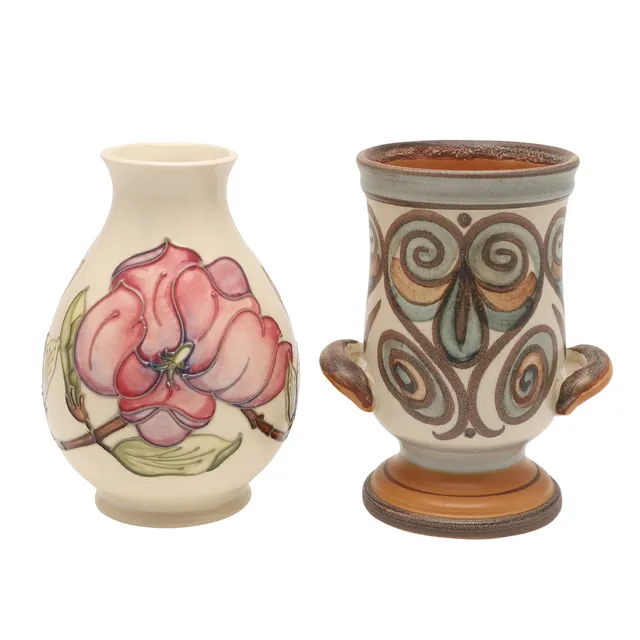 A MODERN MOORCROFT MAGNOLIA PATTERN VASE AND A LANGLEY STUDIO POTTERY VASE.
