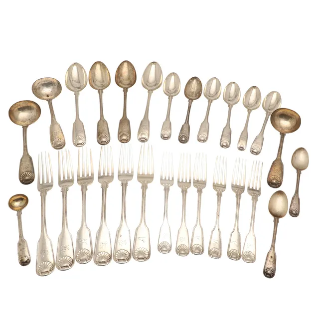 A MATCHED SET OF MAINLY VICTORIAN SILVER FIDDLE, THREAD AND SHELL PATTERN FLATWARE.