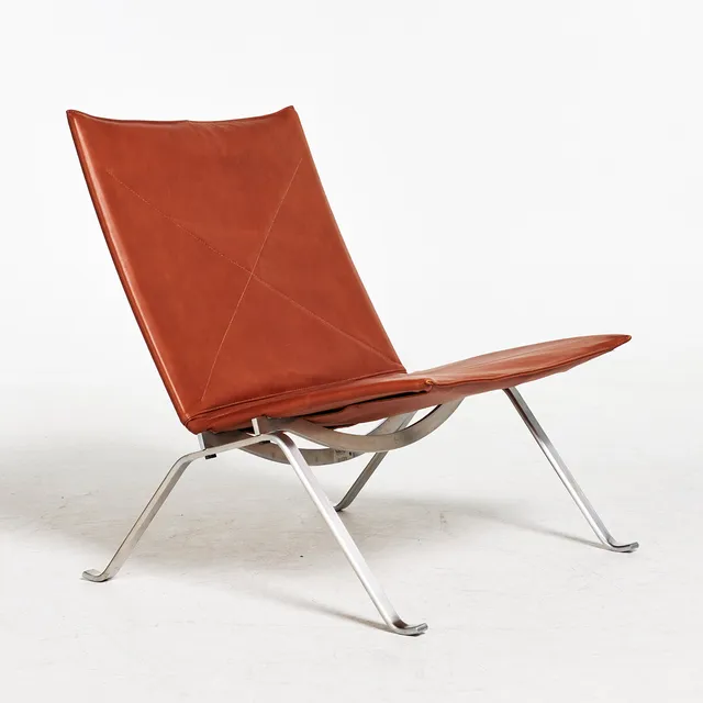 POUL KJAERHOLM. ”PK-22”, fåtölj, för Fritz Hansen, Danmark, stomme i stål, cognacsfärgat läder.