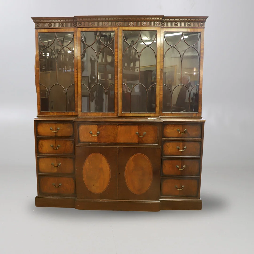 A REPRODUCTION MAHOGANY BREAKFRONT SECRETAIRE BOOKCASE. — Cupboards, Cabinets & Shelves — Lawrences Auctioneers