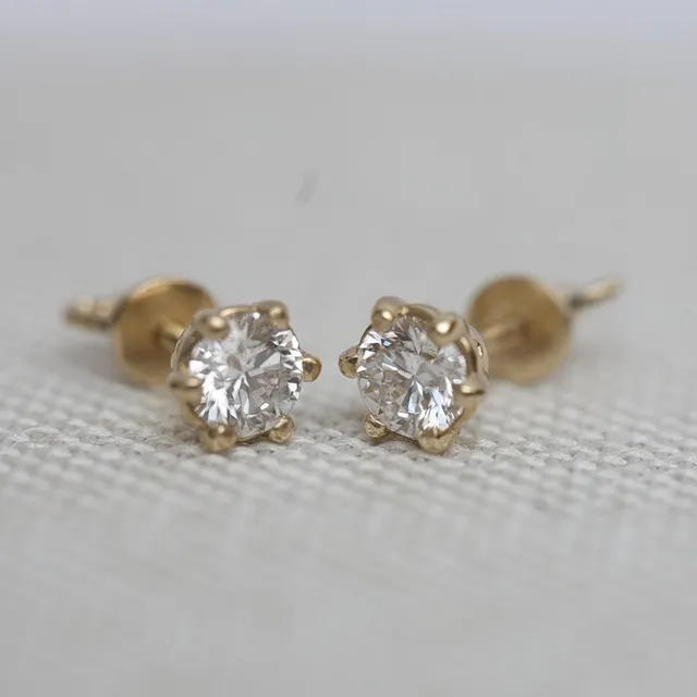 ÖRHÄNGEN ETT PAR, 14k, guld, med infattade diamant på 0,54ct vardera.