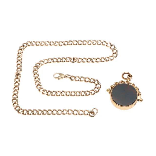 A 9CT GOLD CURB LINK WATCH CHAIN.