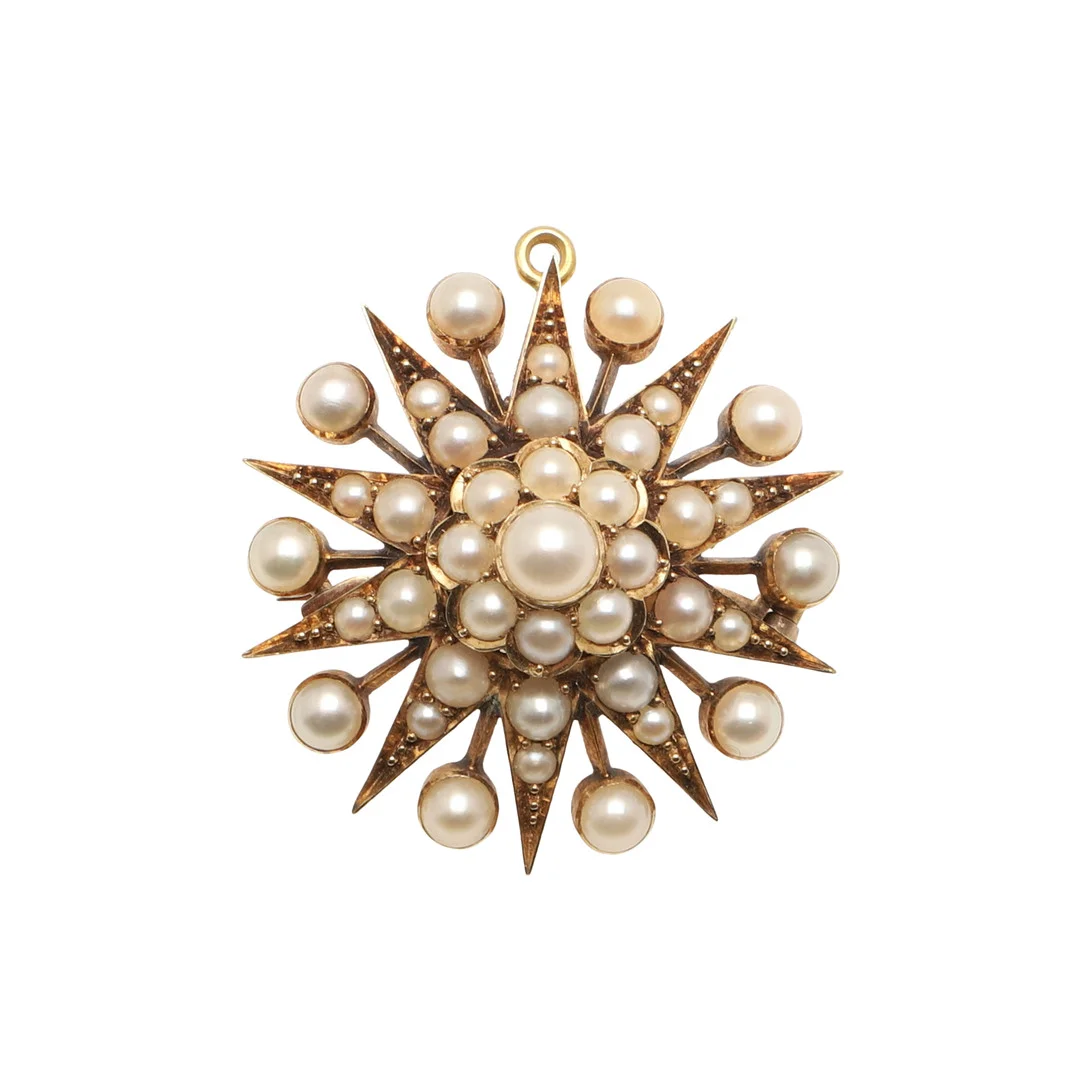 A LATE VICTORIAN GOLD AND PEARL STAR BROOCH/PENDANT. — Brooches & Pendants — Lawrences Auctioneers