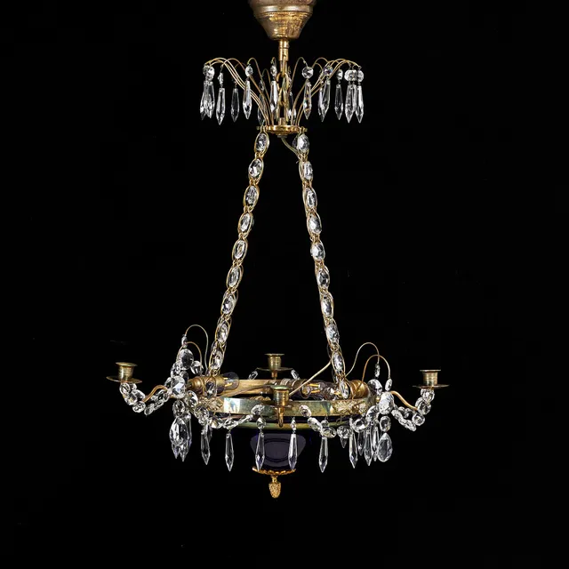 LJUSKRONA, empirestil, stomme i mässing, behängd med olikslipade prismor, 1900-talets andra hälft.