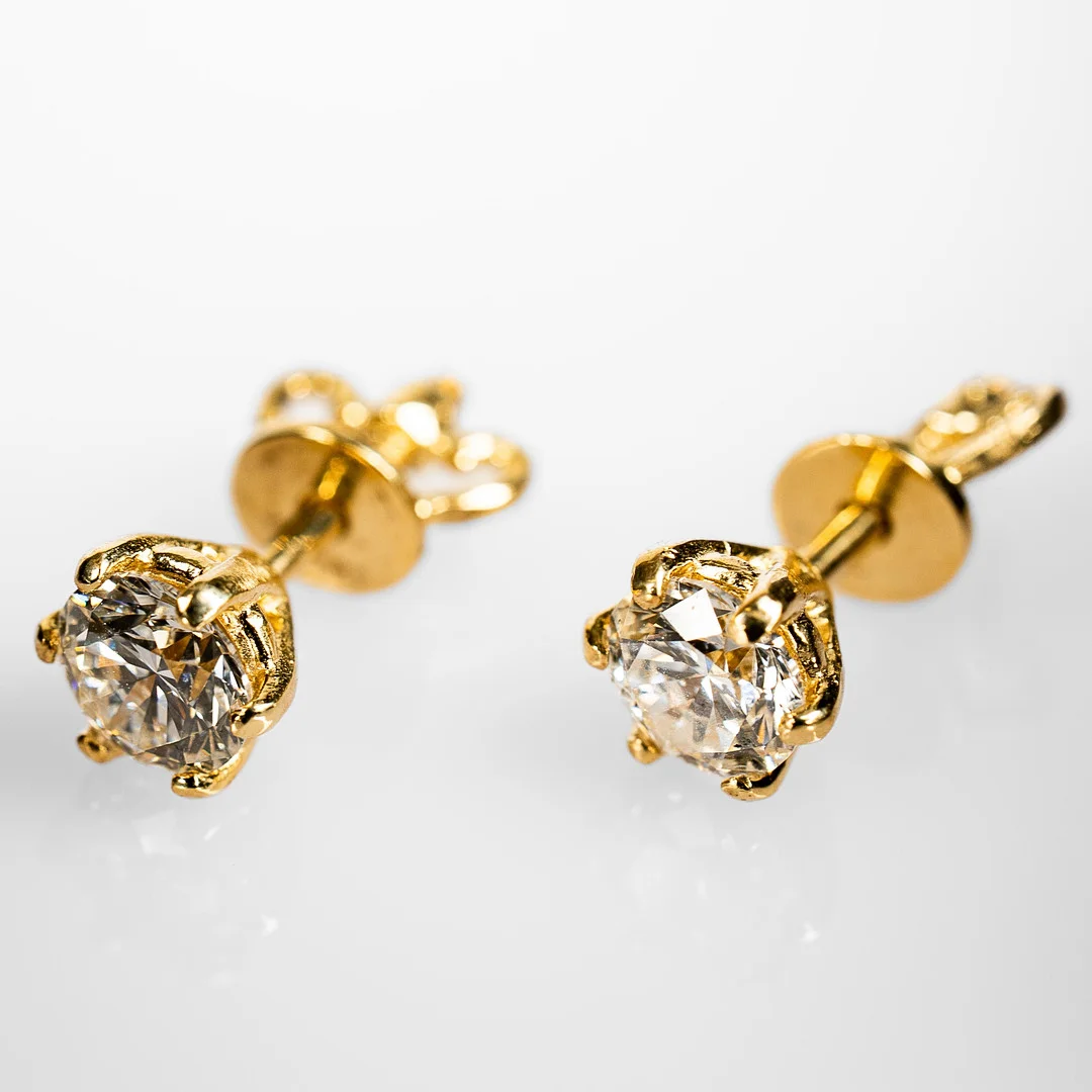 ÖRHÄNGEN. 14K Guld med briljantslipade diamanter 1,12 ct (2st). — Earrings — Norrlands Auktionsverk