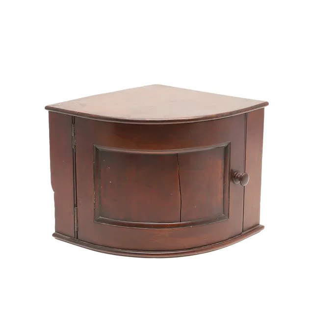 A MAHOGANY CORNER CUPBOARD OF SMALL SIZE.