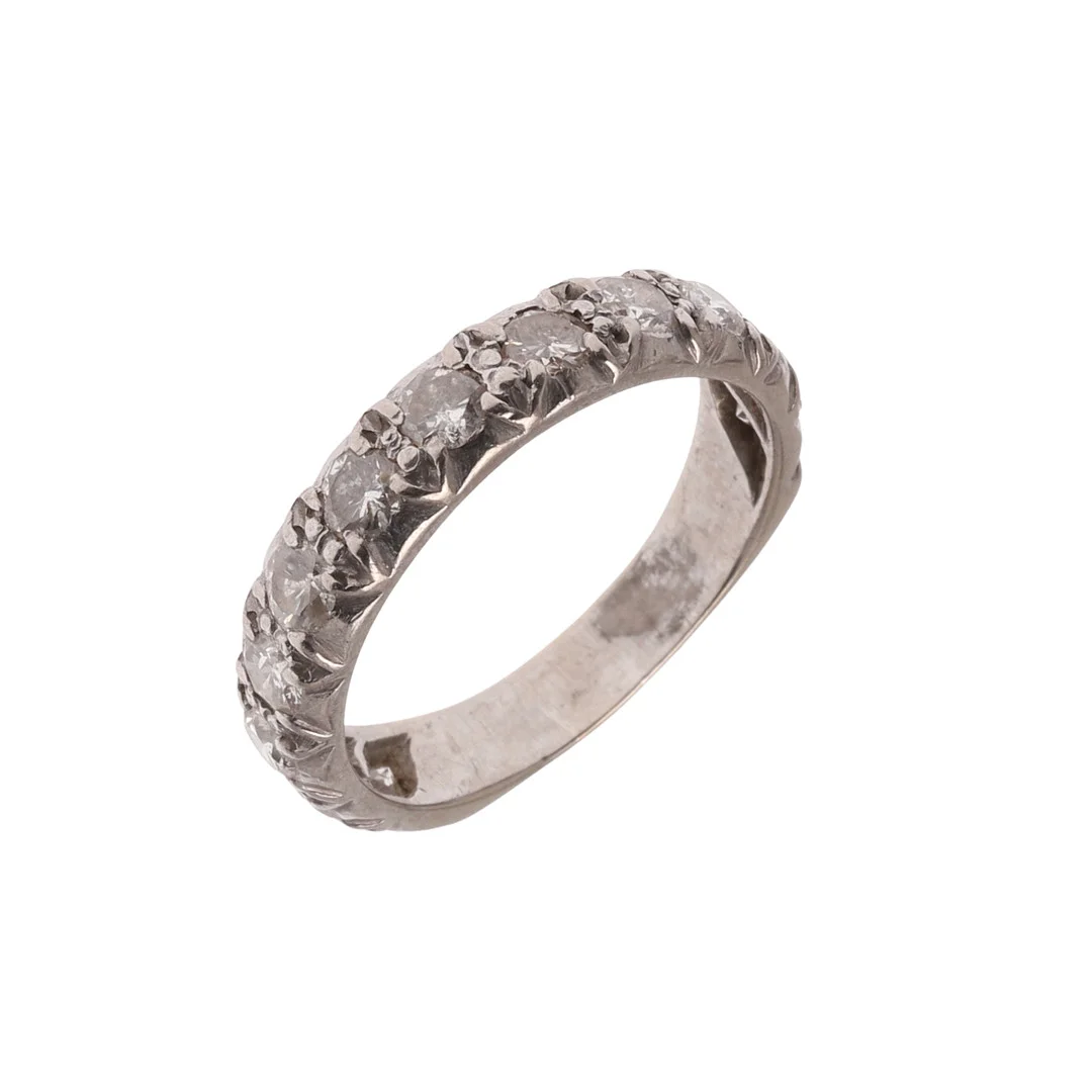 A DIAMOND HALF HOOP ETERNITY RING. — Rings — Lawrences Auctioneers