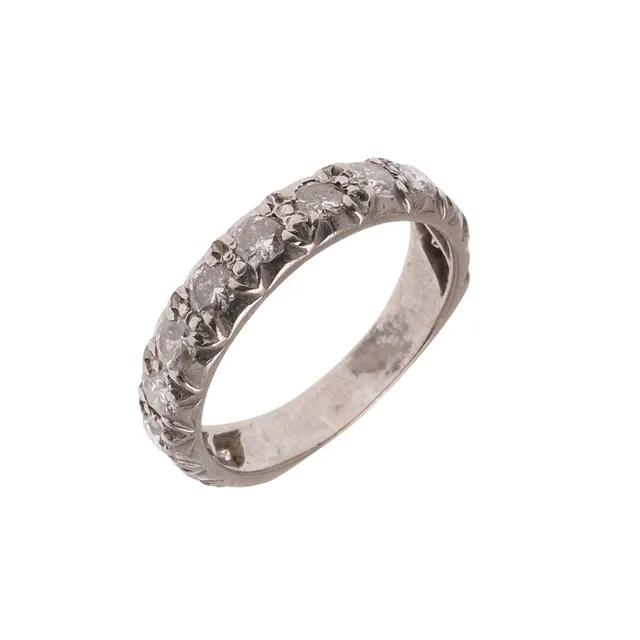 A DIAMOND HALF HOOP ETERNITY RING.