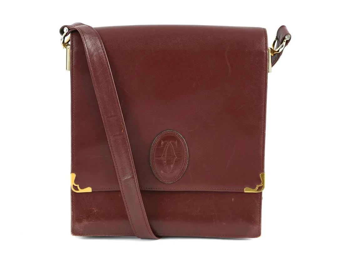 VÄSKA, CARTIER, vintage, vinrött skinn, 20x22cm, — Accessoarer/Väskor — Kaplans