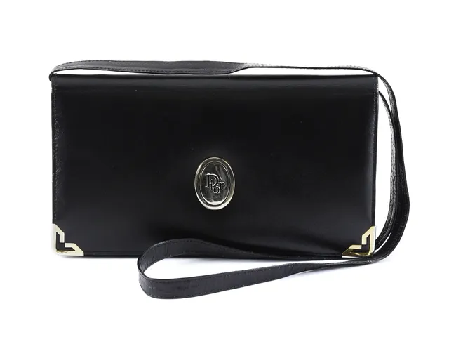 VÄSKA, CHRISTIAN DIOR, vintage, svart läder, 26x14x3 cm, infälld portmonnä, avtagbar axelrem. Visst slitage.