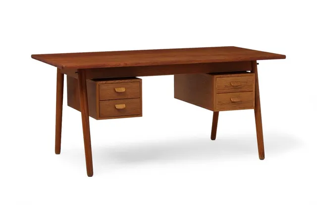 Writing desk in oak with teak top. Two drawer sections, each with two drawers. Model C 35. Designed 1958. Manufactured by FDB. H. 72 cm. L. 160 cm. W. 82 cm.