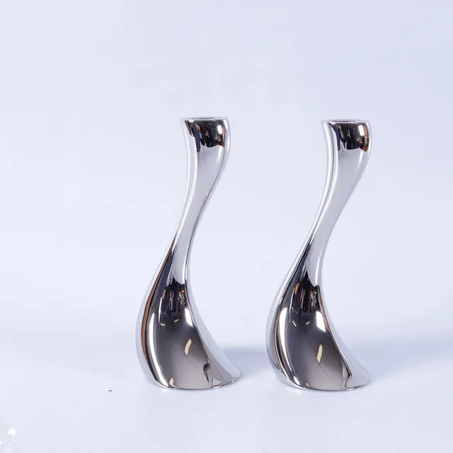 CONSTANTIN WORTMANN. Ljusstakar, 1 par, vitmetall, "Cobra", för Georg Jensen, Danmark.