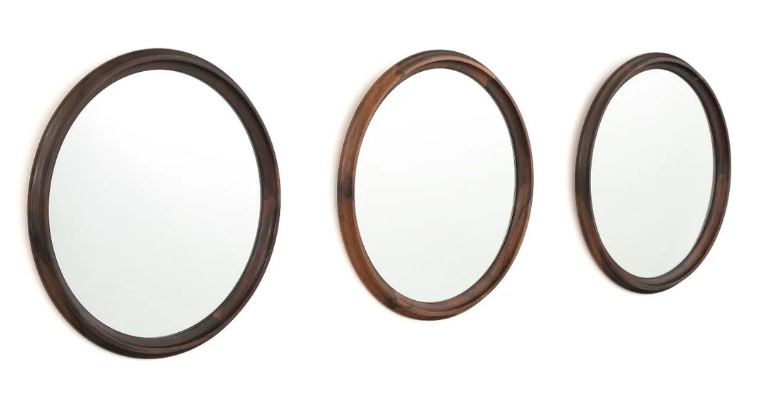 Set of three circular mirrors of Brazilian rosewood. Made by Luxus, Sweden. 1960s. Diam. 48.5. (3) — Modern Furniture — Bruun Rasmussen