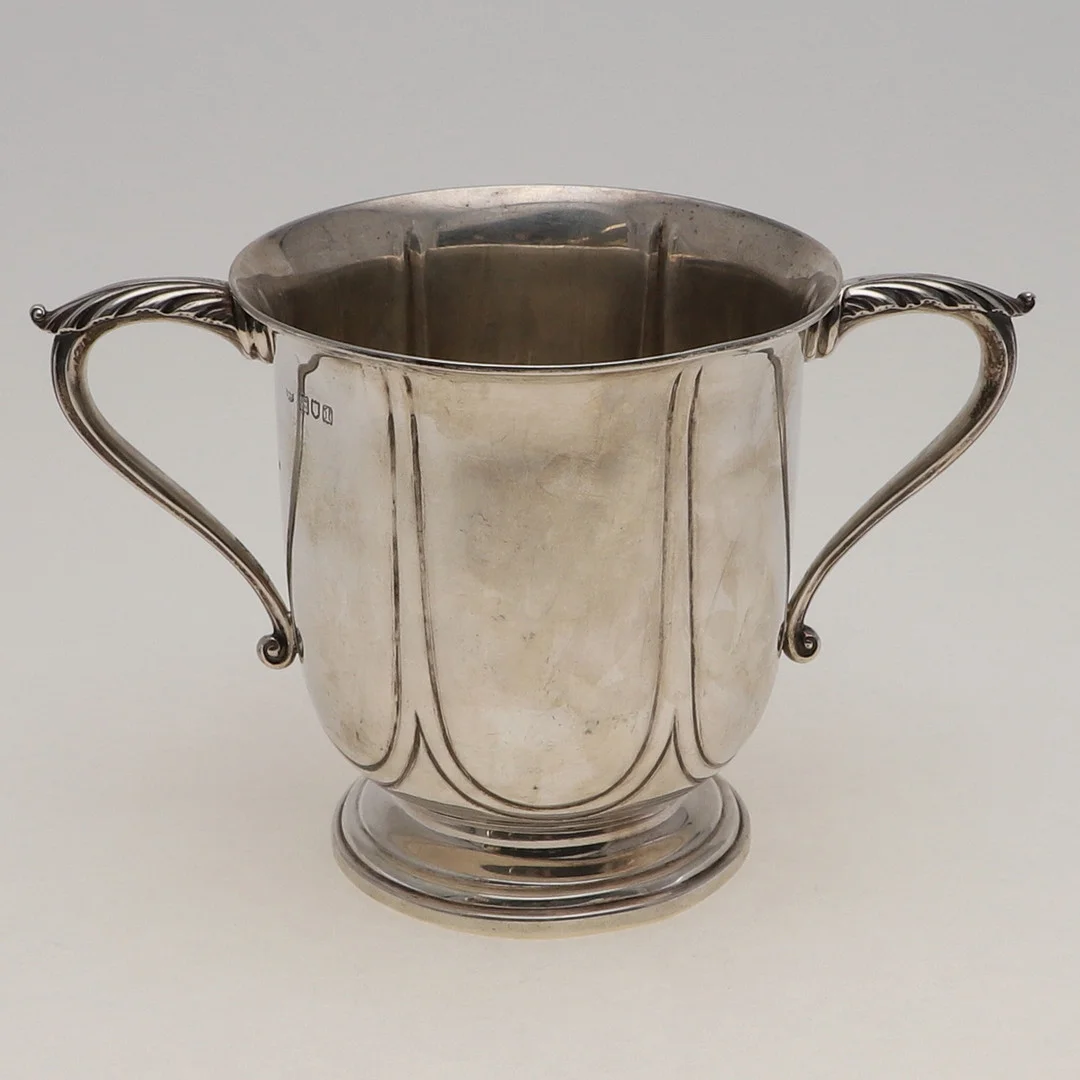 AN EDWARDIAN TWO-HANDLED CUP. — Silver — Lawrences Auctioneers
