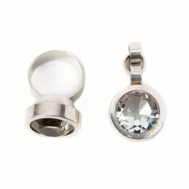ELIS KAUPPI, ring samt hänge, sterlingsilver och fasettslipad bergkristall, Kupittaan Kulta, Turku, Finland.