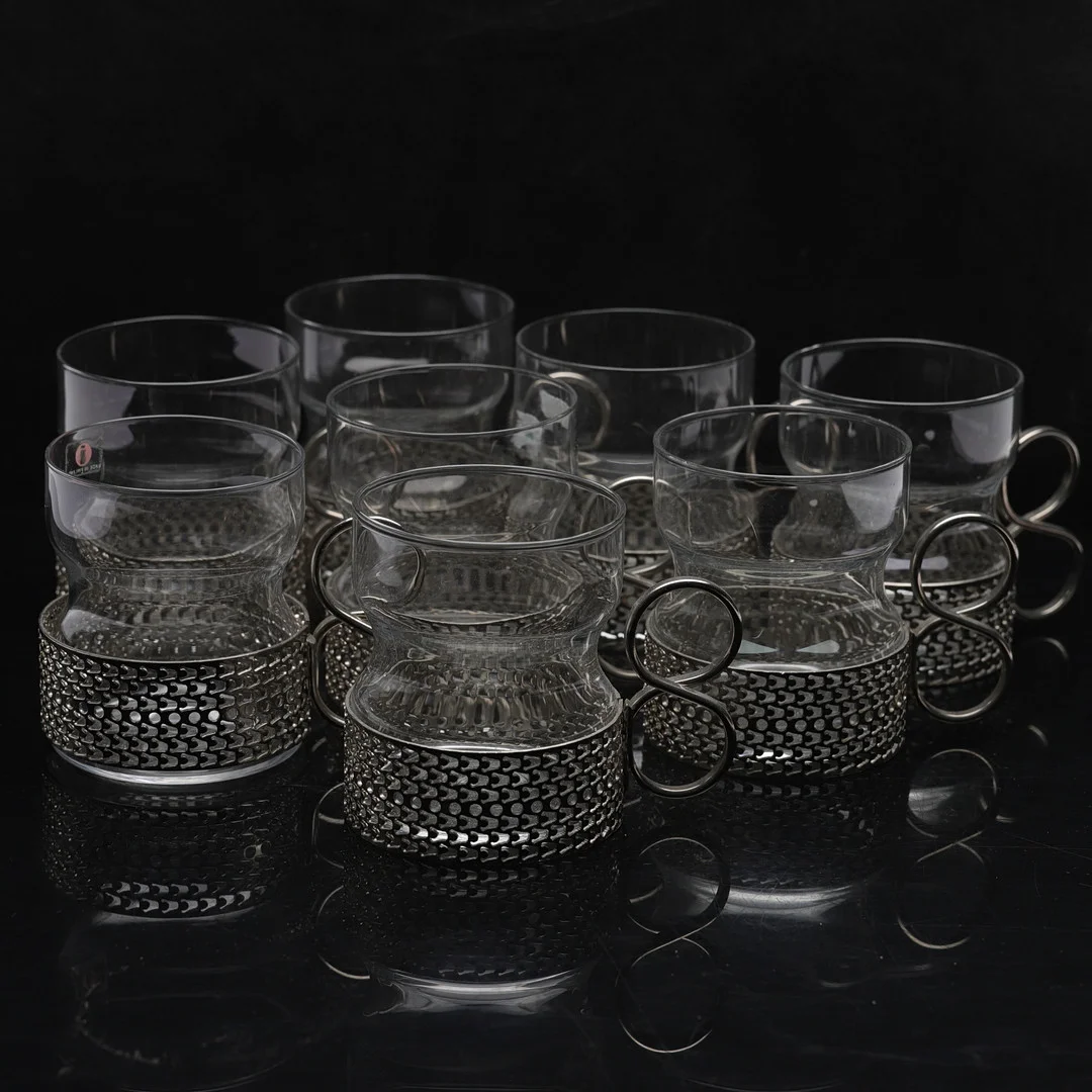 TIMO SARPANEVA. Glas med hållare, 8 st,"Tsaikka", glas och metall, Iittala, Finland. — Utility glass — Gomér & Andersson Norrköping
