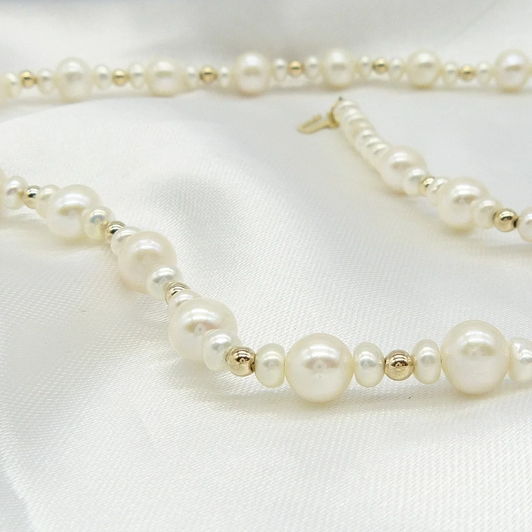 CULTURED PEARL & GOLD NECKLACE. — Necklace — Rumsey’s Auctioneers