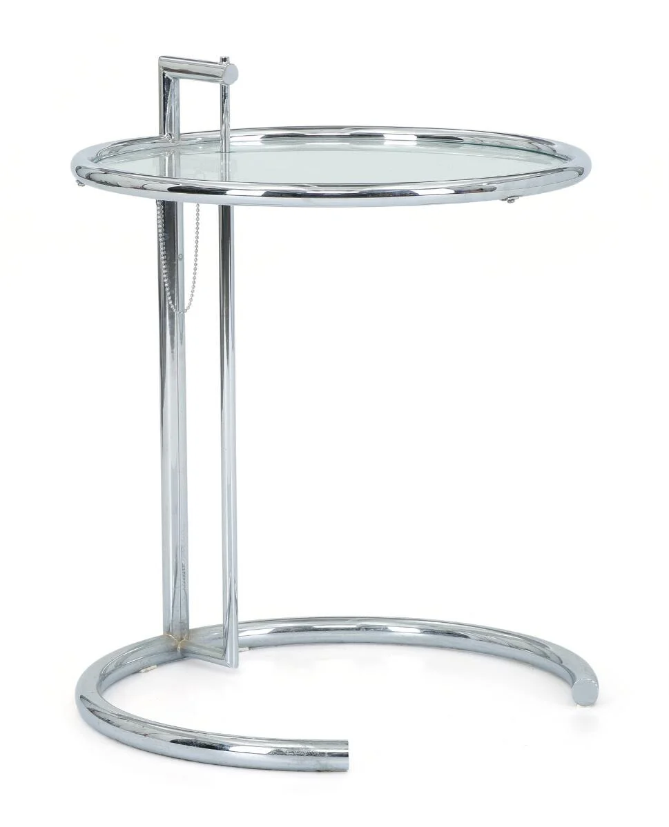 Side table with tubular chromed steel frame and circular clear glass top. Model E1027. Designed 1927. Manufactured and marked by ClassiCon. Height-adjustable. H. 55–93 cm. Diam. 51 cm. — Modern Furniture — Bruun Rasmussen