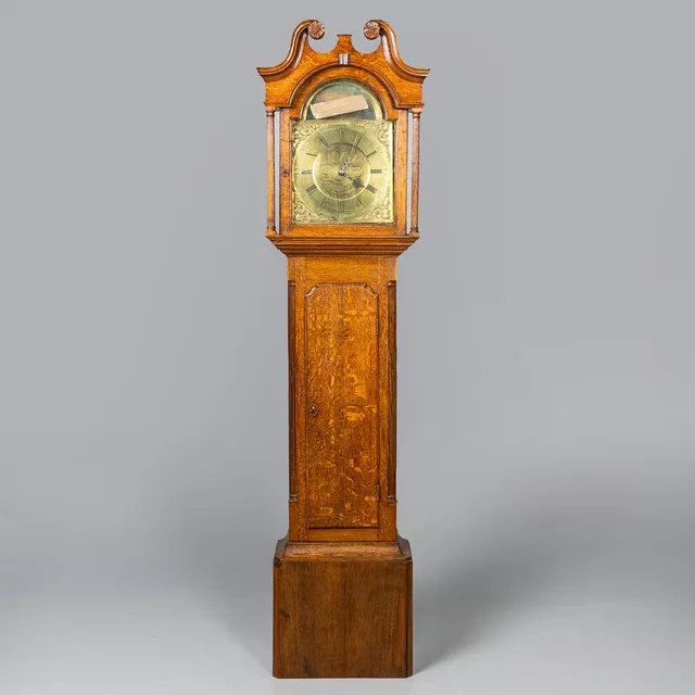 T GATE CARLISLE OAK LONGCASE CLOCK.