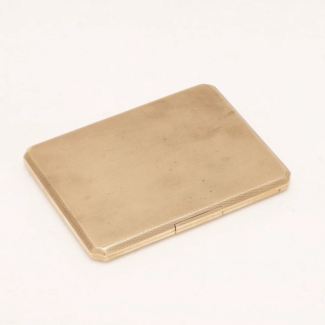 A GEORGE V 9CT. GOLD CIGARETTE CASE. — Silver — Lawrences Auctioneers