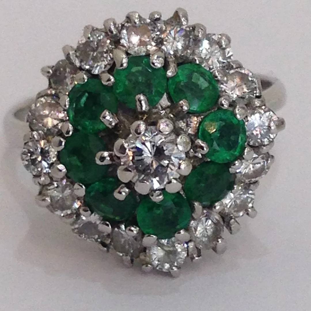 EMERALD AND DIAMOND CLUSTER RING. — Rings — Rumsey’s Auctioneers