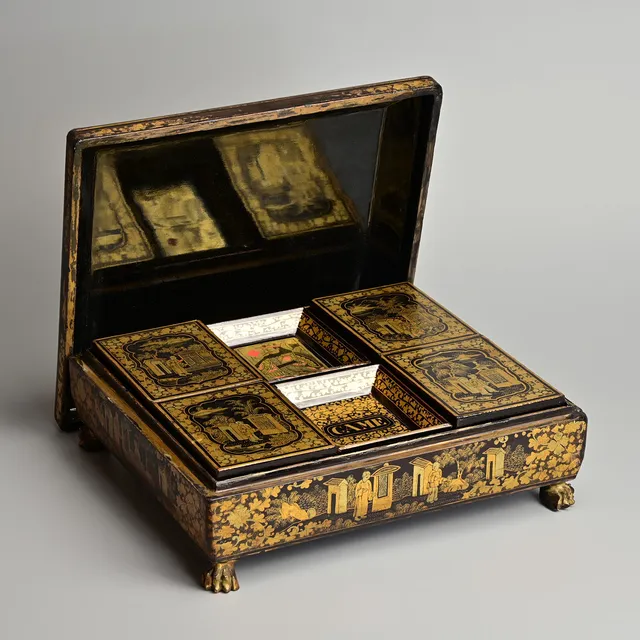A CHINESE CANTON EXPORT LACQUER GAMES BOX, LATE 19TH CENTURY.