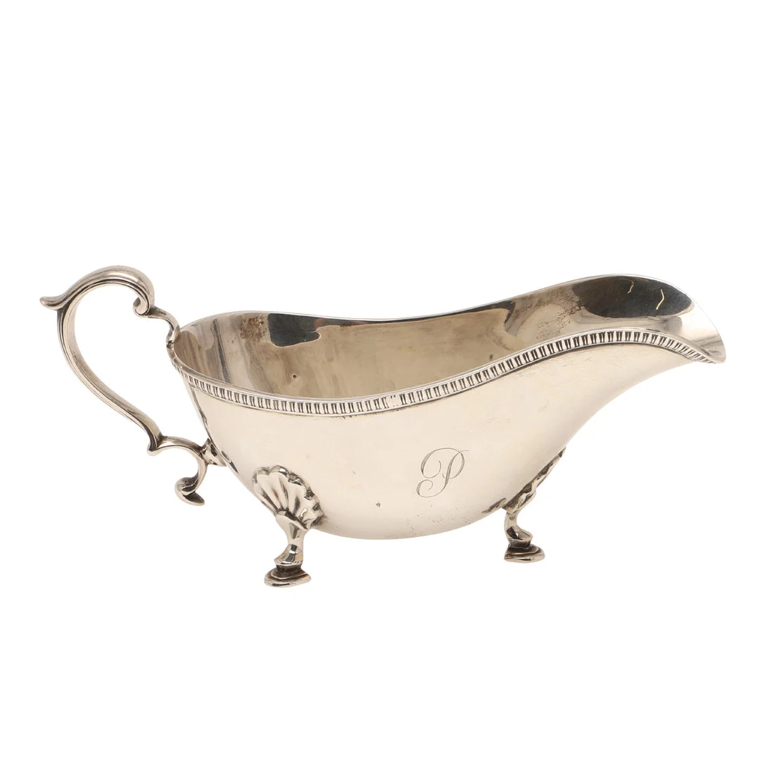 AN GEORGE VI SILVER SAUCE BOAT. — Silver — Lawrences Auctioneers