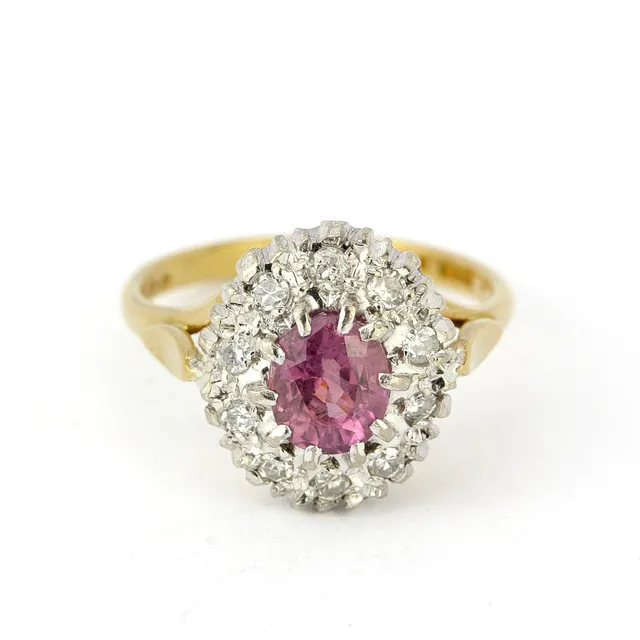 18CT GOLD DIAMOND & TOURMALINE RING.