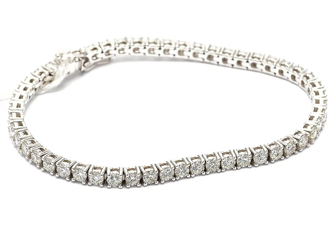 Tennisarmband med diamanter 52xca0,08ct caTcr/VS-SI 18K vitguld 11,9g 16,5cm — Smycken/Armband — Kaplans