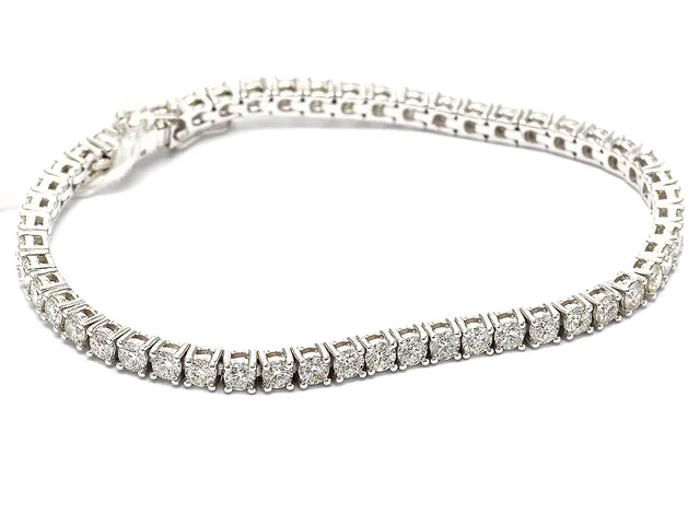 Tennisarmband med diamanter 52xca0,08ct caTcr/VS-SI 18K vitguld 11,9g 16,5cm