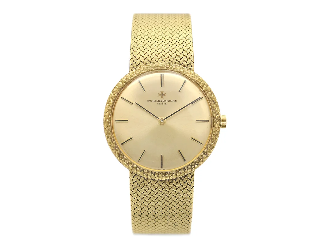 VACHERON & CONSTANTIN, Genève, herrur, 32,5 mm, Cal K 1001/2, Serie nr. 611843, Ref nr. 7296, Boett nr. 450888, 18K guld, manuell, plexiglas, skadad urtavla (6/10), integrerad originallänk, längd 167 mm, totalvikt 62,4 gram, ca 1975. — Klockor/Vacheron Constantin — Kaplans