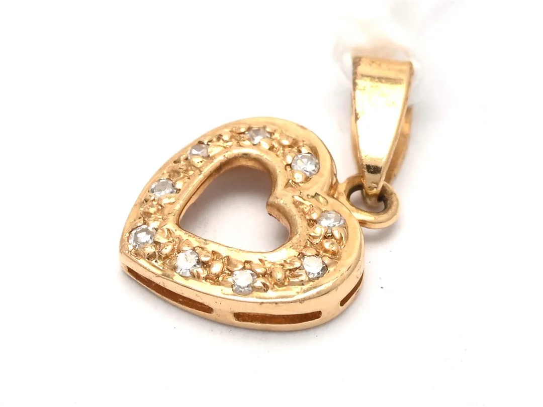 Hänge 18K 0,6g längd (ink ögla): 15mm, med åttkantslipade diamanter 9xca0,005ct — Smycken/Hänge — Kaplans
