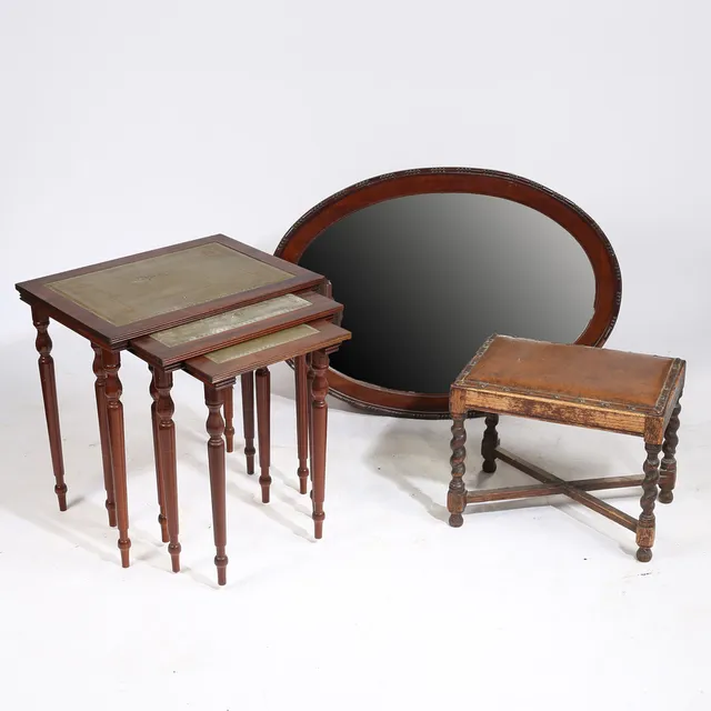 A NEST OF THREE TABLES, A MAHOGANY WALL MIRROR AND A SMALLL OAK AND LEATHER TOPPED STOOL (3).