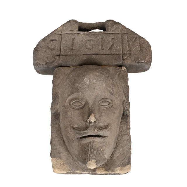 A CARVED STONE ARCHITECTURAL CORBEL OR MASQUE.
