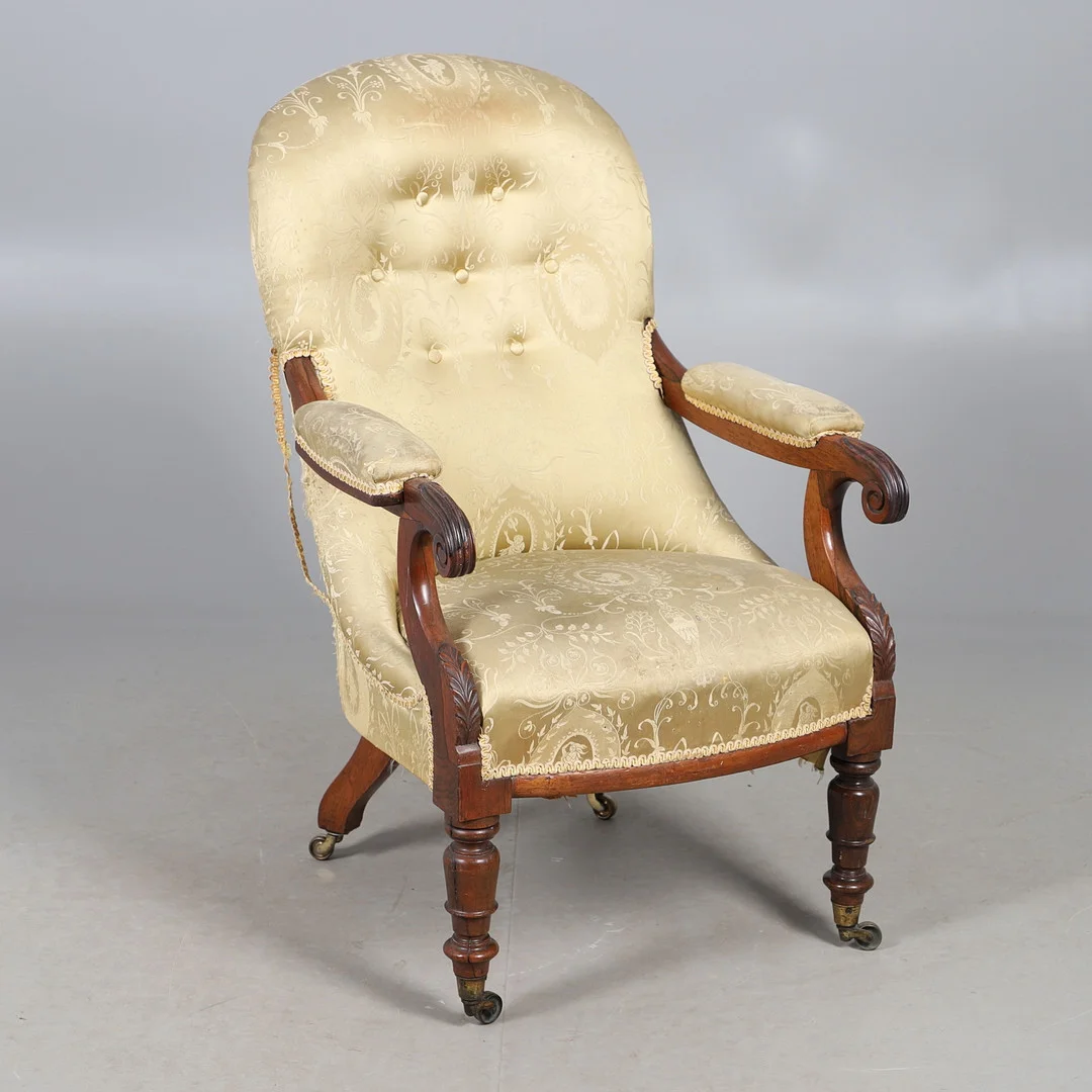 AN EARLY VICTORIAN ROSEWOOD FRAMED BUTTON BACK SALON CHAIR. — Armchairs & Chairs — Lawrences Auctioneers