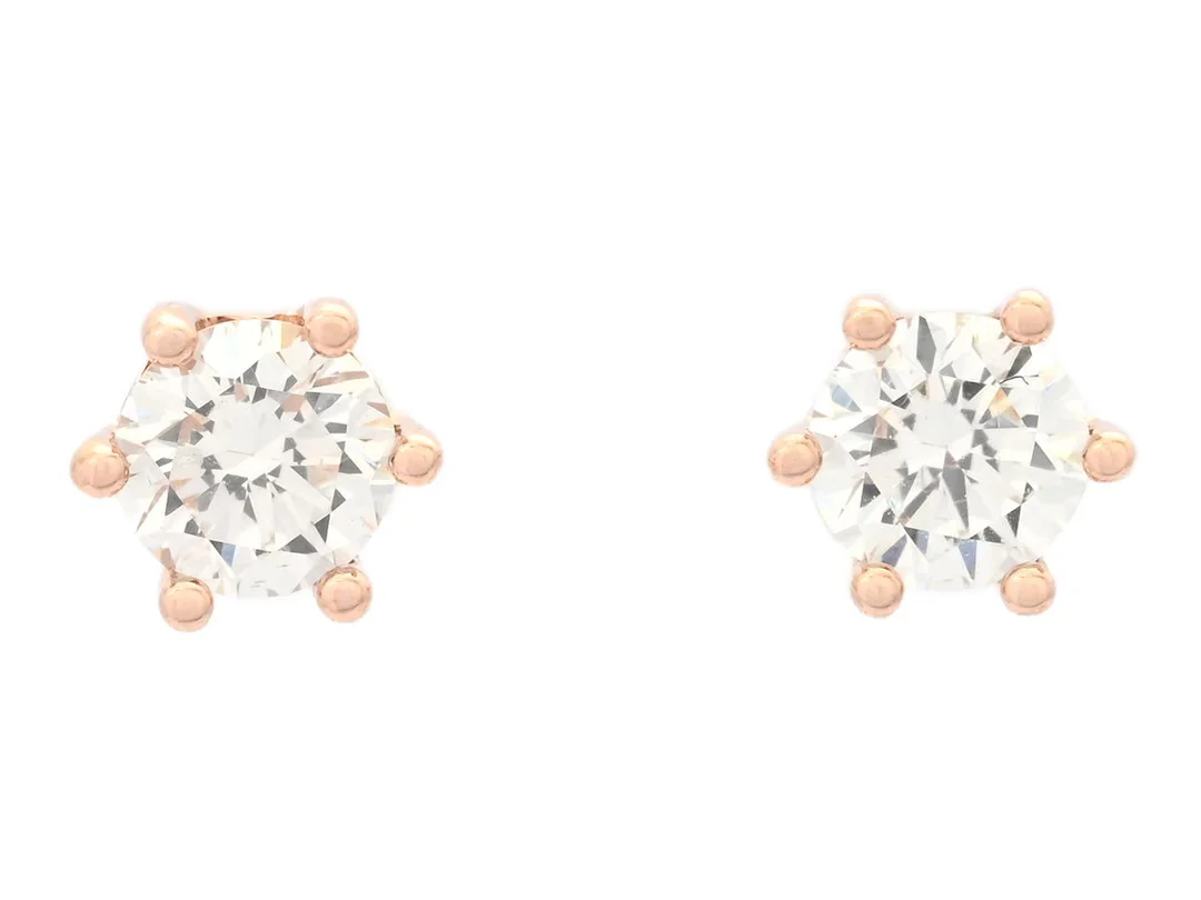 ENSTENSÖRHÄNGEN, 18K roséguld, briljantslipade diamanter ca 0,16 ctv, ca TW-W/VS, stift, vikt 1,4 g. — Smycken/Enstensörhängen — Kaplans