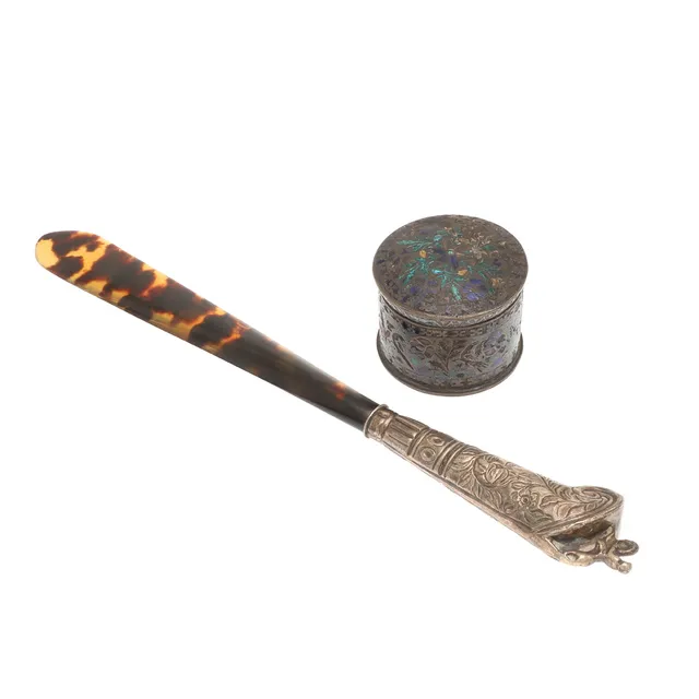 A VICTORIAN SILVER MOUNTED TORTOISESHELL PAGE TURNER AND A CHAMPLEVE BOX.