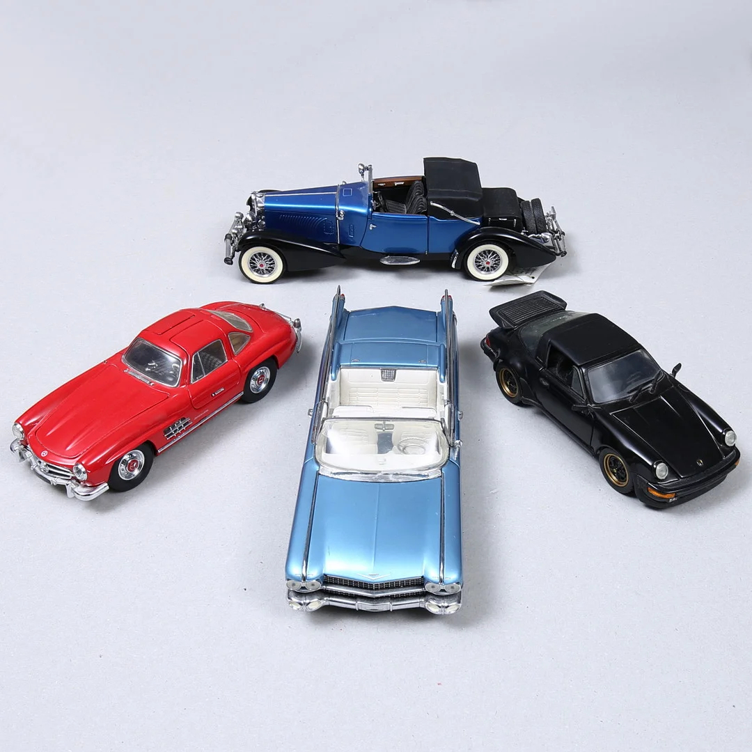 FRANKLIN MINT, 4 st modellbilar, bland annat Cadillac Eldorado 1959. — Toys — Auktionshuset Kolonn
