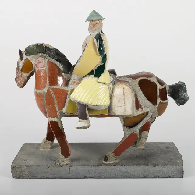 OLLE NYMAN. Collageskulptur, man till häst, signerad O Nyman.