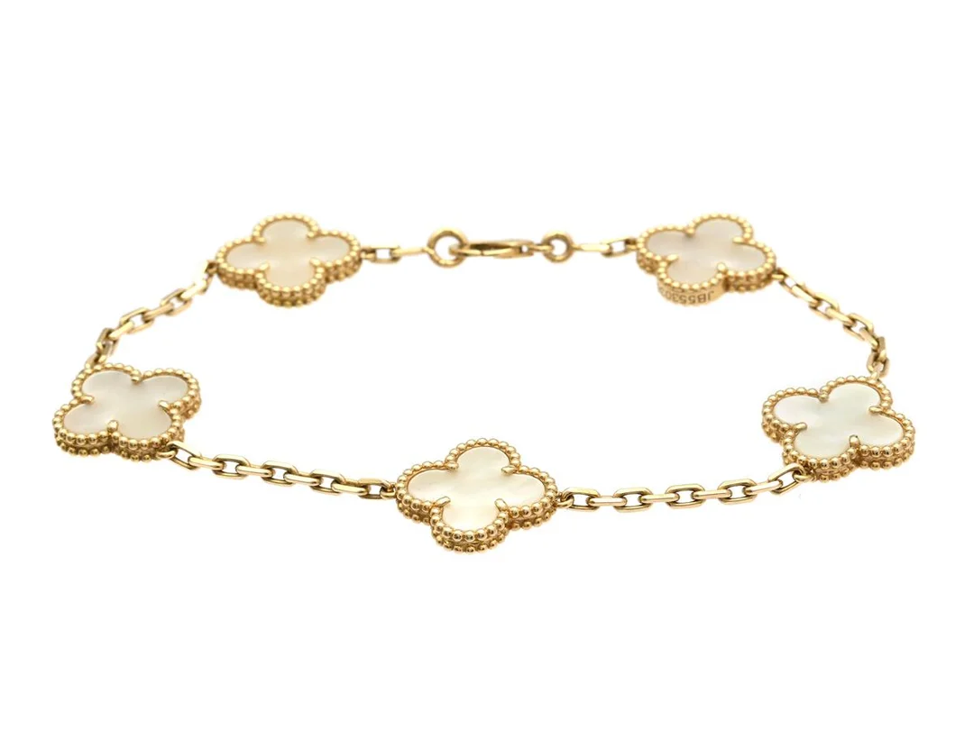 VAN CLEEF & ARPELS armband, Vintage Alhambra, 18K guld, pärlemor, serienr JB553036, längd 19 cm, vikt 11,7 g, originaletui, ytterask. — Smycken/Armband — Kaplans