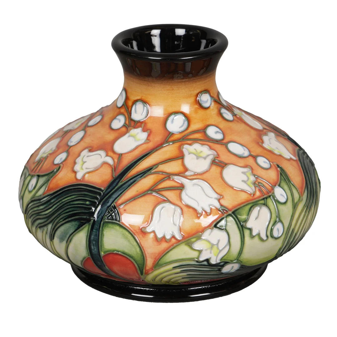 EMMA BOSSONS FOR MOORCROFT, VASE OF SQUAT FORM IN THE "LILY OF THE VALLEY" PATTERN. — European — Bishop & Miller