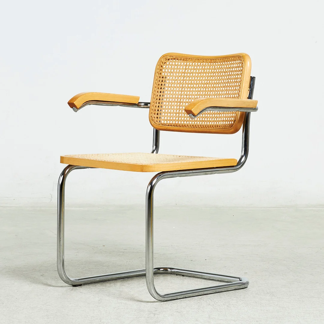 MARCEL BREUER. EFTER. Karmstol "Cesca B32", märkt "Italy", kromad stomme samt bok och rotting. — Armchairs & Chairs — Stockholms Auktionsverk Sickla