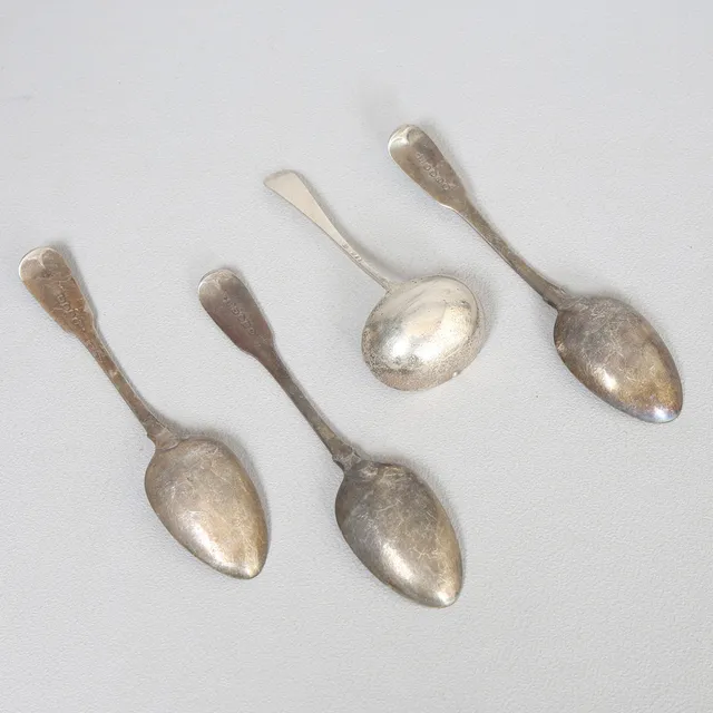 THREE GEORGE III SILVER DESSERT SPOONS, A GEORGE V SILVER LADLE (4).