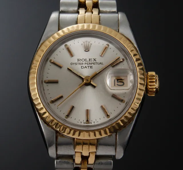 Rolex Oyster Perpetual Date. Vintage women's wristwatch made of steel and gold.