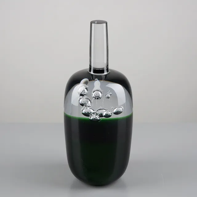 REIMA MAARONEN (1957). GLASSKULPTUR, flaska, signerad Reima Maaronen, gröntonat helglas.