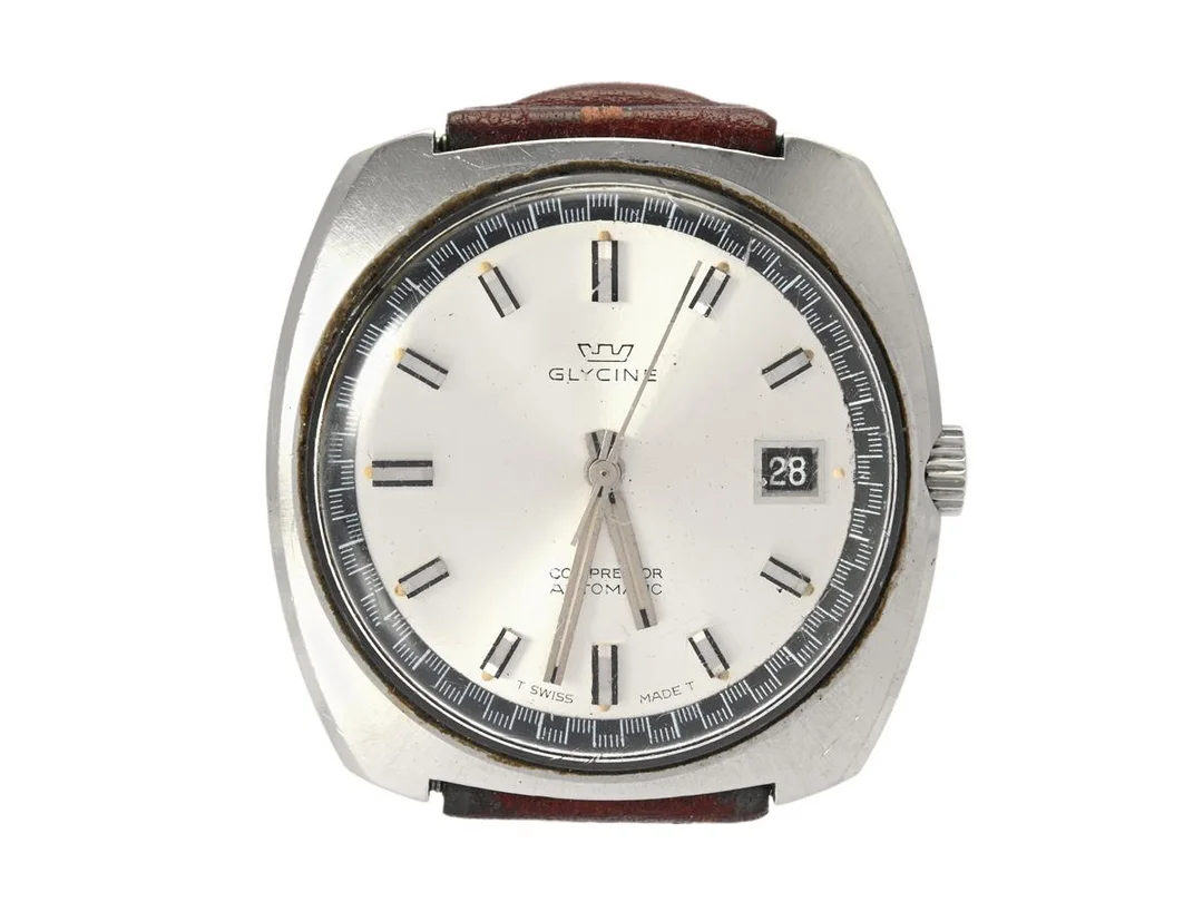 GLYCINE, Compressor (T Swiss Made T), Cal ETA 2632, Serie nr. 1070532, Boett nr. 332-111, herrur, 37 x 36 (37) mm, stål, automatisk, plexiglas, datum, skadad urtavla, ca 1970. — Klockor/Glycine — Kaplans