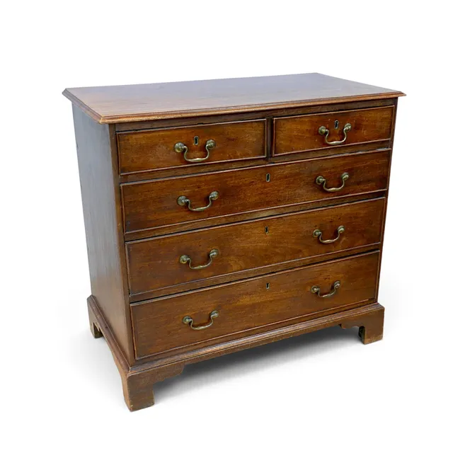 A GEORGE III MAHOGANY CHEST.
