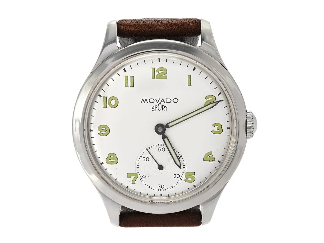 MOVADO, Sport, "Francois Borgel Case", Cal 125, Boett nr. 1164700/18136, herrur, 34 mm, stål, manuell, plexiglas, liten sekundvisare, renoverad/relumad urtavla/visare, läderband, ca 1950. — Klockor/Movado — Kaplans