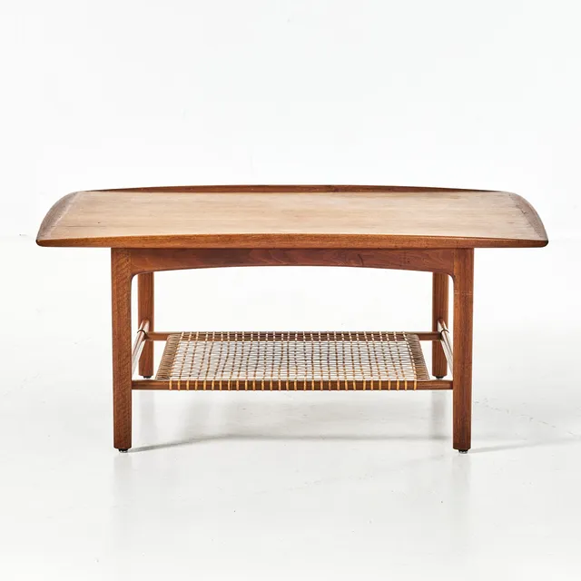 FOLKE OHLSSON. Soffbord, "Frisco", för Dux, 1960-tal, teak, underhylla av flätad rotting, märkt undertill.